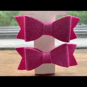 Pair of pastel pink hair bows